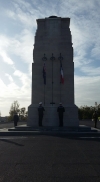 Navy personnel raising the New Zealand and French flag